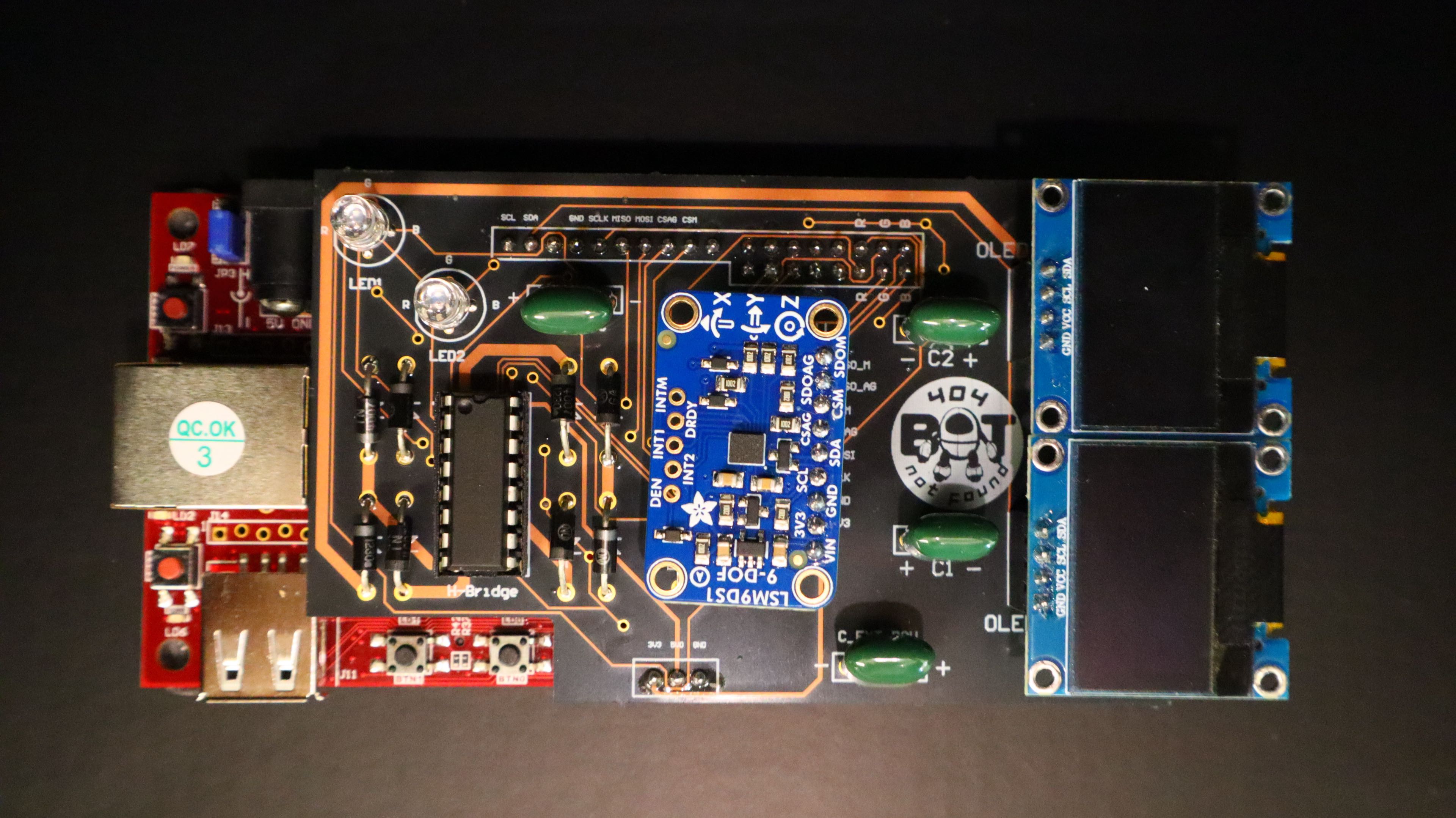 Complete Cora Z7 educational platform with its custom peripheral PCB, IMU sensor, and OLED displays